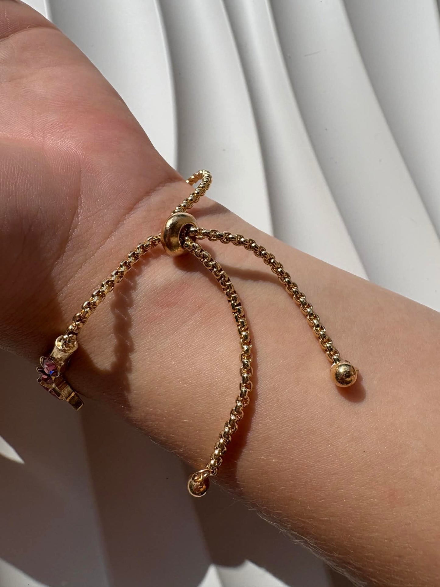 Montre bracelet dorée et rose étoiles