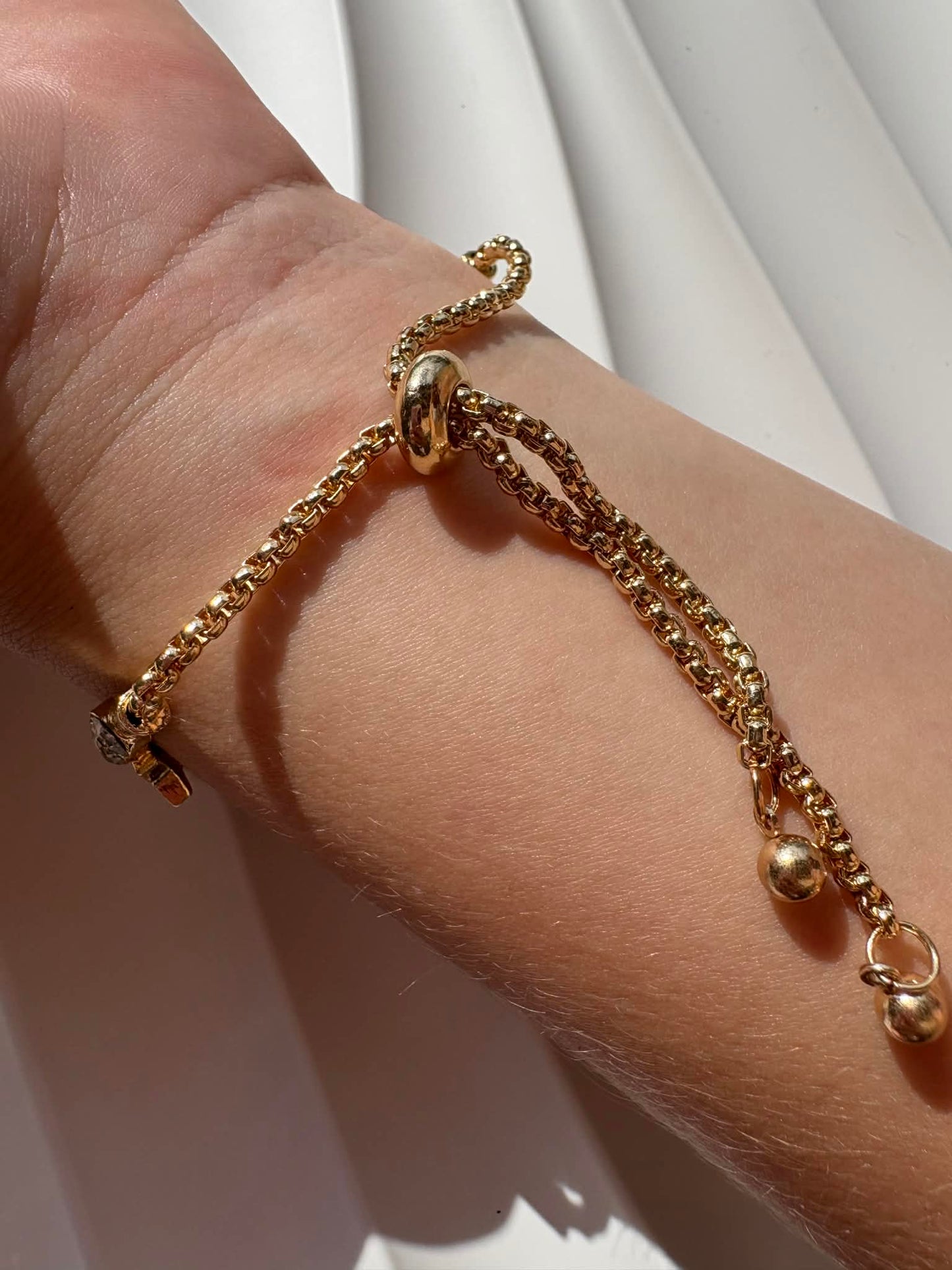 Montre bracelet dorée étoiles