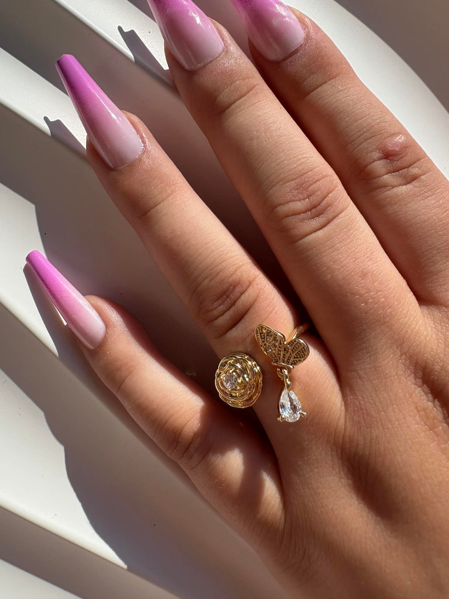 Bague papillon & bague fleur dorées