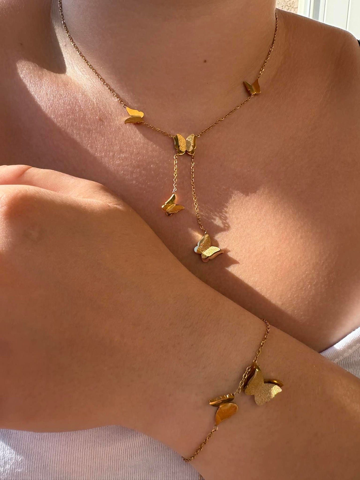 Parure collier + bracelet papillons dorés
