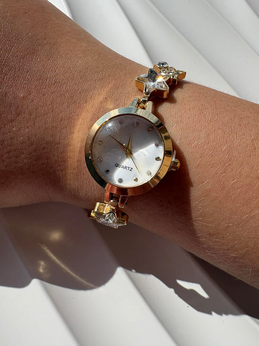 Montre bracelet dorée étoiles