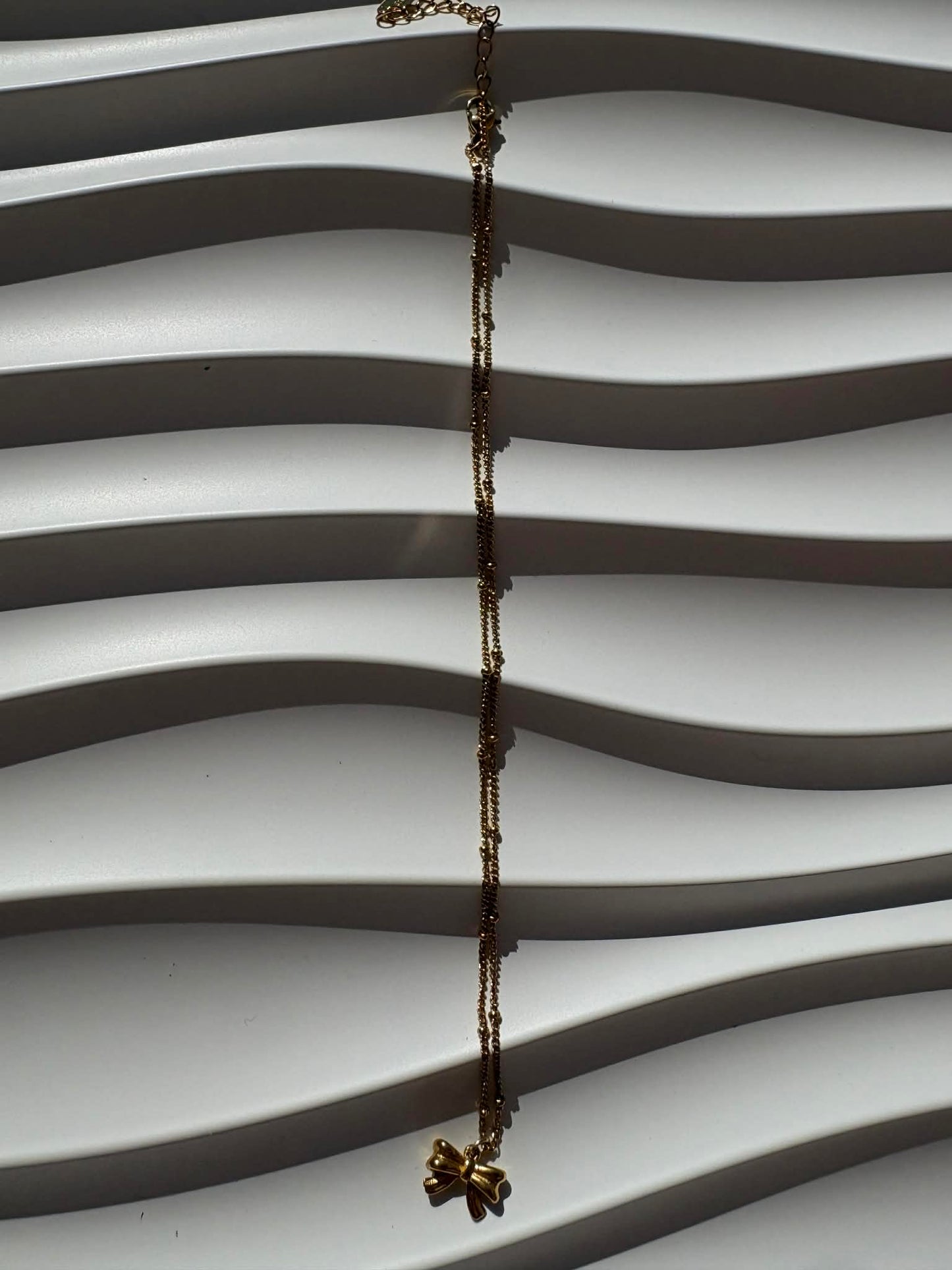 Collier nœud doré